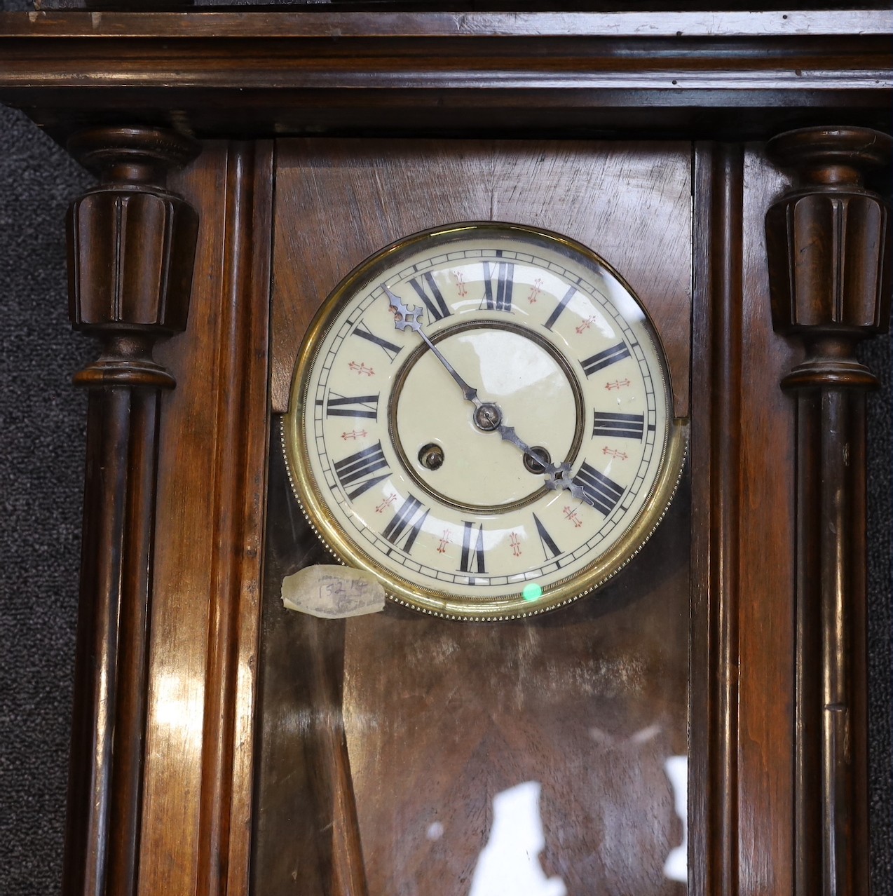 Two late 19th / early 20th century Vienna type wall clocks, larger 119 cms and a set of oak cased scientific beam scales.